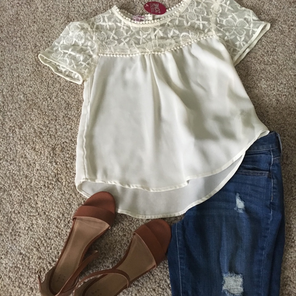 Cute cream colored short sleeve embroidered top